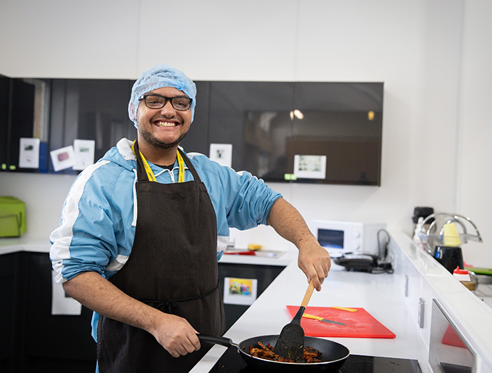 Student learning how to cook